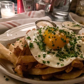 Au Cheval - Fries with the runny egg and amazing aioli - Bars Near Me - Chicago, Illinois