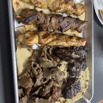 Kapadokia Grill - Mediterranean Turkish - Regular Family Meal (lamb kebab, chicken kebab, lamb shish, lamb patties) the patty and shaved meat I might have the name wrong - Turkish Near Me - Greensboro, North Carolina Kapadokia Grill - Mediterranean Turkish - Regular Family Meal (lamb kebab, chicken kebab, lamb shish, lamb patties) the patty and shaved meat I might have the name wrong - Turkish Near Me - Greensboro, North Carolina