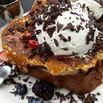 Urth Caffe - Dutch style shaved chocolates on top!  Stuffed french toast with stuff everywhere - Coffee & Tea Near Me - Laguna Beach, California