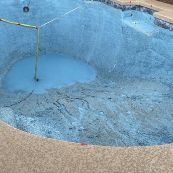 Creative Pool Plastering - Surprise  Monsoon during pebble application. - Pool & Hot Tub Service Near Me