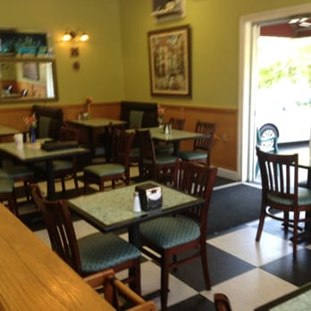 Frank's Pizzeria - tables and chairs in a restaurant - Pizza Near Me - New Windsor, New York Frank's Pizzeria - tables and chairs in a restaurant - Pizza Near Me - New Windsor, New York
