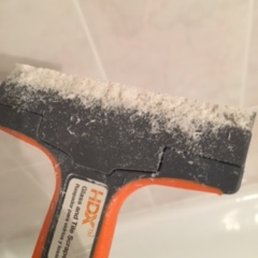 Dried slurry scraped off ONE tile because job was not done properly. This was on the majority of the tiles. Dried slurry scraped off ONE tile because job was not done properly. This was on the majority of the tiles.