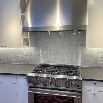 Daniel Lugo Construction - New range and hood. Daniel had to cut the counter and cabinet on the left side - General Contractors Near Me Daniel Lugo Construction - New range and hood. Daniel had to cut the counter and cabinet on the left side - General Contractors Near Me