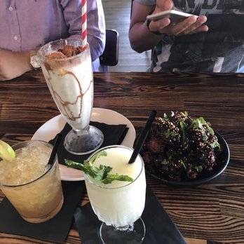 Hundred Proof - A couple of the cocktails and a adult shake along with the chicken oysters. - San Diego, CA
