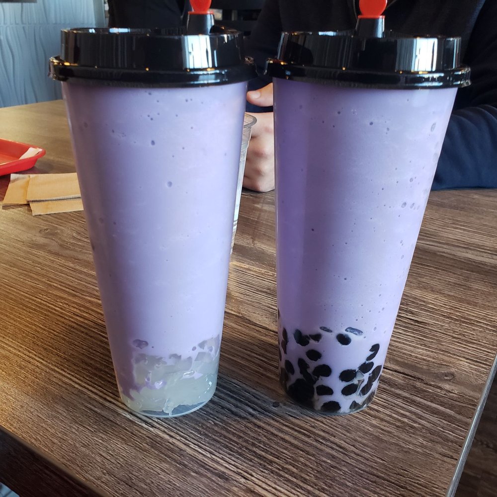 Cafe Trang Bistro - Try the taro smoothies. One on the left is with lychee jelly, one on right is with boba. Pick lychee if you like it sweeter! - Vietnamese Near Me - Lehi, Utah Cafe Trang Bistro - Try the taro smoothies. One on the left is with lychee jelly, one on right is with boba. Pick lychee if you like it sweeter! - Vietnamese Near Me - Lehi, Utah