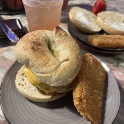 Main Squeeze Juice - Plant based sausage and dairy free cheese on a sourdough bagel