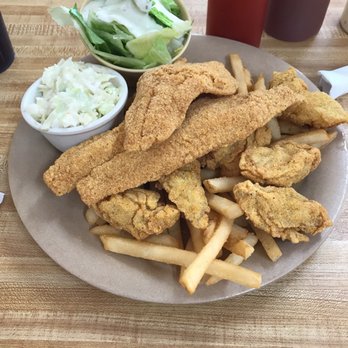 Ro's Seafood - The #42 6 oyster with 2 fish and french fries  Sides coleslaw and salad - Seafood Near Me - Lumberton, Texas