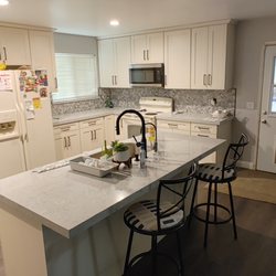 Maple & Stone Cabinetry N More, Inc. - We remodeled the entire kitchen with flooring, cabinets, countertops, and backsplash. The countertop is quartz.