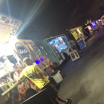 Bel-Go - a man standing in front of a food truck - Food Trucks Near Me - Bal harbour, Florida Bel-Go - a man standing in front of a food truck - Food Trucks Near Me - Bal harbour, Florida