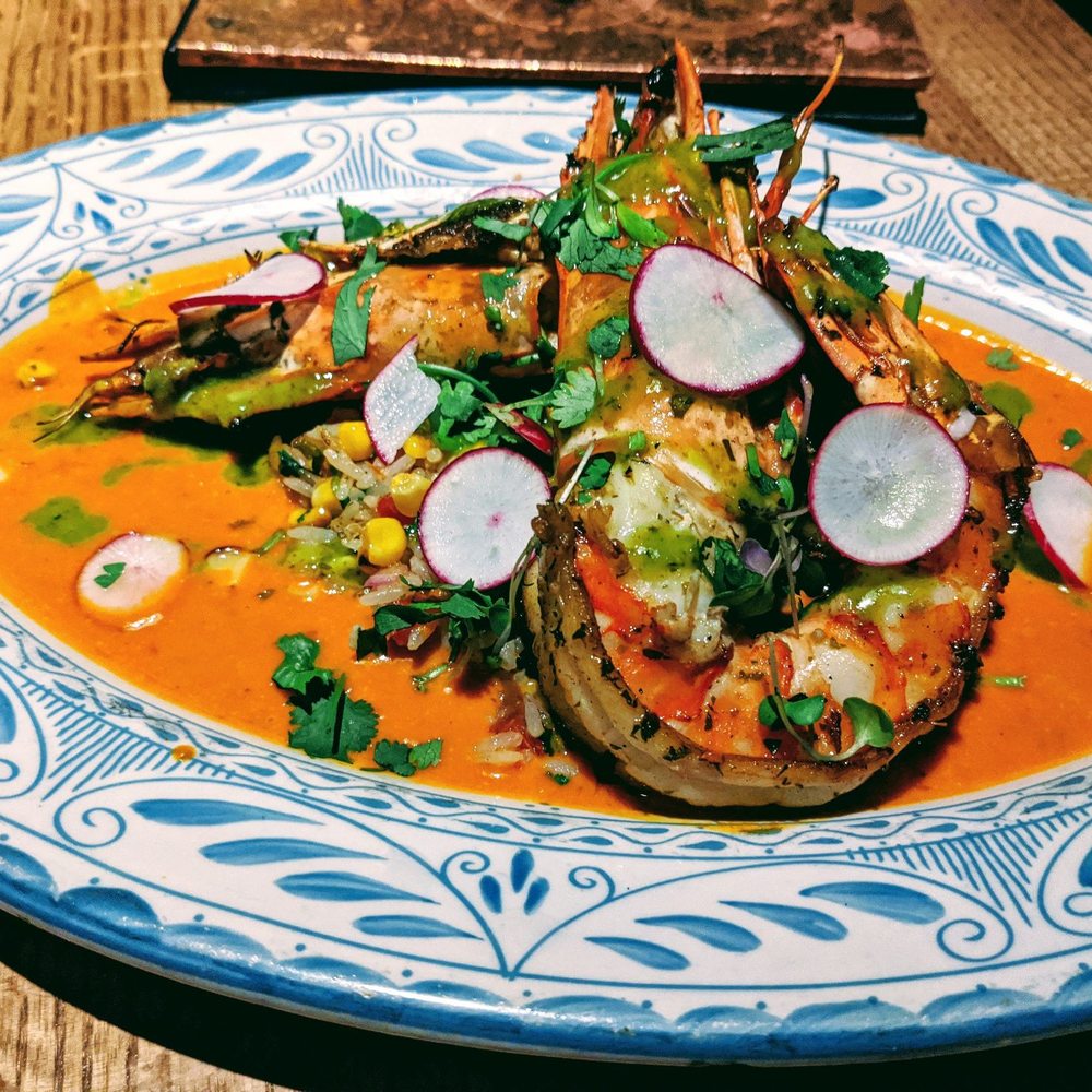 Barrio - Grilled Jumbo Prawns - coconut chili broth, Spanish rice, mojo de ajo - Mexican Near Me - Chicago, Illinois Barrio - Grilled Jumbo Prawns - coconut chili broth, Spanish rice, mojo de ajo - Mexican Near Me - Chicago, Illinois