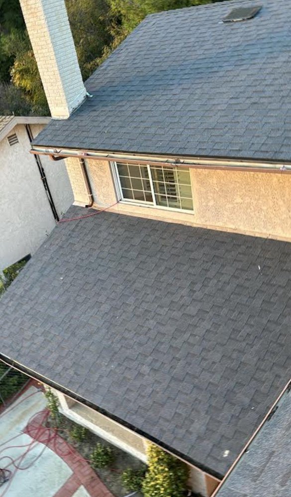 Slide of Precision Roofing