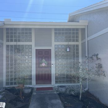 Rainwater Gutter Systems - Front door gutter, downspout and flashing. - Gutter Services Near Me - Palm Harbor, Florida Rainwater Gutter Systems - Front door gutter, downspout and flashing. - Gutter Services Near Me - Palm Harbor, Florida