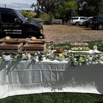 Top Tier Tacos - a table with food on it - Caterers Near Me Top Tier Tacos - a table with food on it - Caterers Near Me