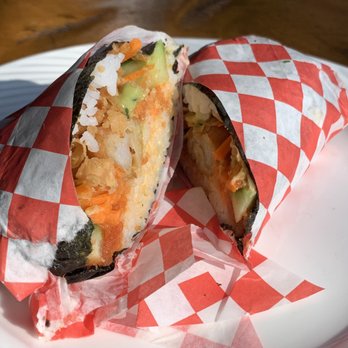 Sloopy's Beach Cafe - Sushi Burrito (nori, sushi rice, sriracha aioli, spicy tuna, tempura shrimp, carrots, cucumber, wonton strips) - American Near Me - Manhattan Beach, California Sloopy's Beach Cafe - Sushi Burrito (nori, sushi rice, sriracha aioli, spicy tuna, tempura shrimp, carrots, cucumber, wonton strips) - American Near Me - Manhattan Beach, California