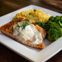 Aegean Greek Restaurant - Grilled Salmon topped with Feta Dill Cream