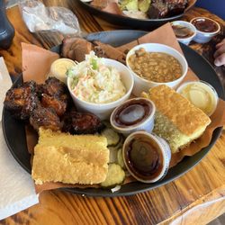 Karl's Bar B Q Express - To meet platter with burnt pork, belly ends, brisket, coleslaw, and beans.