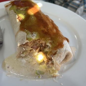 La Ranchera - Beef burrito after it had been cut into - Mexican Near Me - Sherman, Texas La Ranchera - Beef burrito after it had been cut into - Mexican Near Me - Sherman, Texas