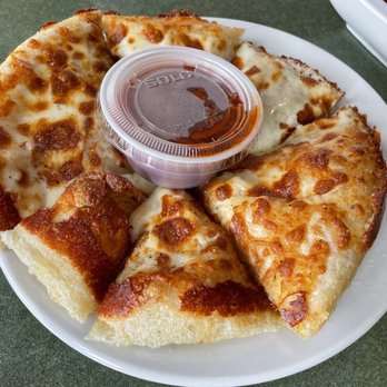 Undo's Italian Restaurant - Small cheesy bread - comes with marinara. - Italian Near Me - Weirton, West Virginia Undo's Italian Restaurant - Small cheesy bread - comes with marinara. - Italian Near Me - Weirton, West Virginia