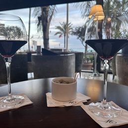 Red wine with complimentary olives Red wine with complimentary olives