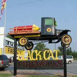 Black Market Fireworks - Black Cat Truck in front of store.