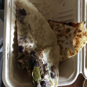Quesadilla Gorilla - Ingredients distribution is highly uneven. - Mexican Near Me - Fresno, California Quesadilla Gorilla - Ingredients distribution is highly uneven. - Mexican Near Me - Fresno, California