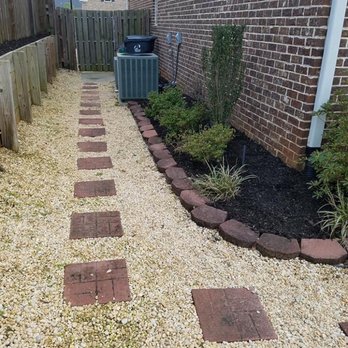Home Pro Services - a brick pathway between two houses - Painters Near Me - Augusta, Georgia Home Pro Services - a brick pathway between two houses - Painters Near Me - Augusta, Georgia