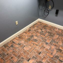 Halpin's Flooring America - Porcelain Brick Pavers installed on a straight herringbone