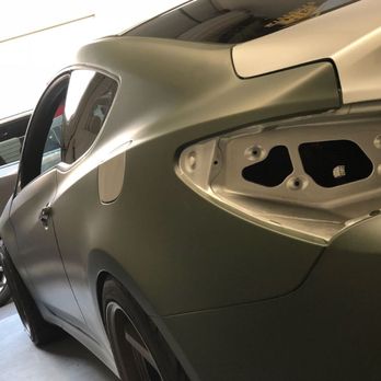G-spot Autoworks - Car in process of being wrapped Matte Miltary Green. Attention to detail is important. - Auto Customization Near Me - Vista, California G-spot Autoworks - Car in process of being wrapped Matte Miltary Green. Attention to detail is important. - Auto Customization Near Me - Vista, California