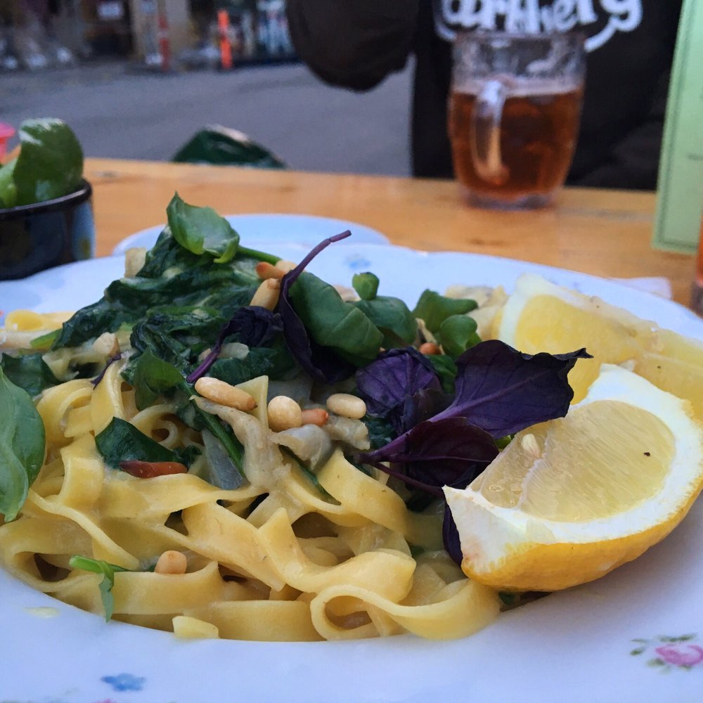 Cafe Dyrehaven - Tagliatelle with lightly salted Saithe | Saffron cream sauce, spinach, pine nuts, salad with asparagus and carrot - Bars Near Me - Copenhagen, 84