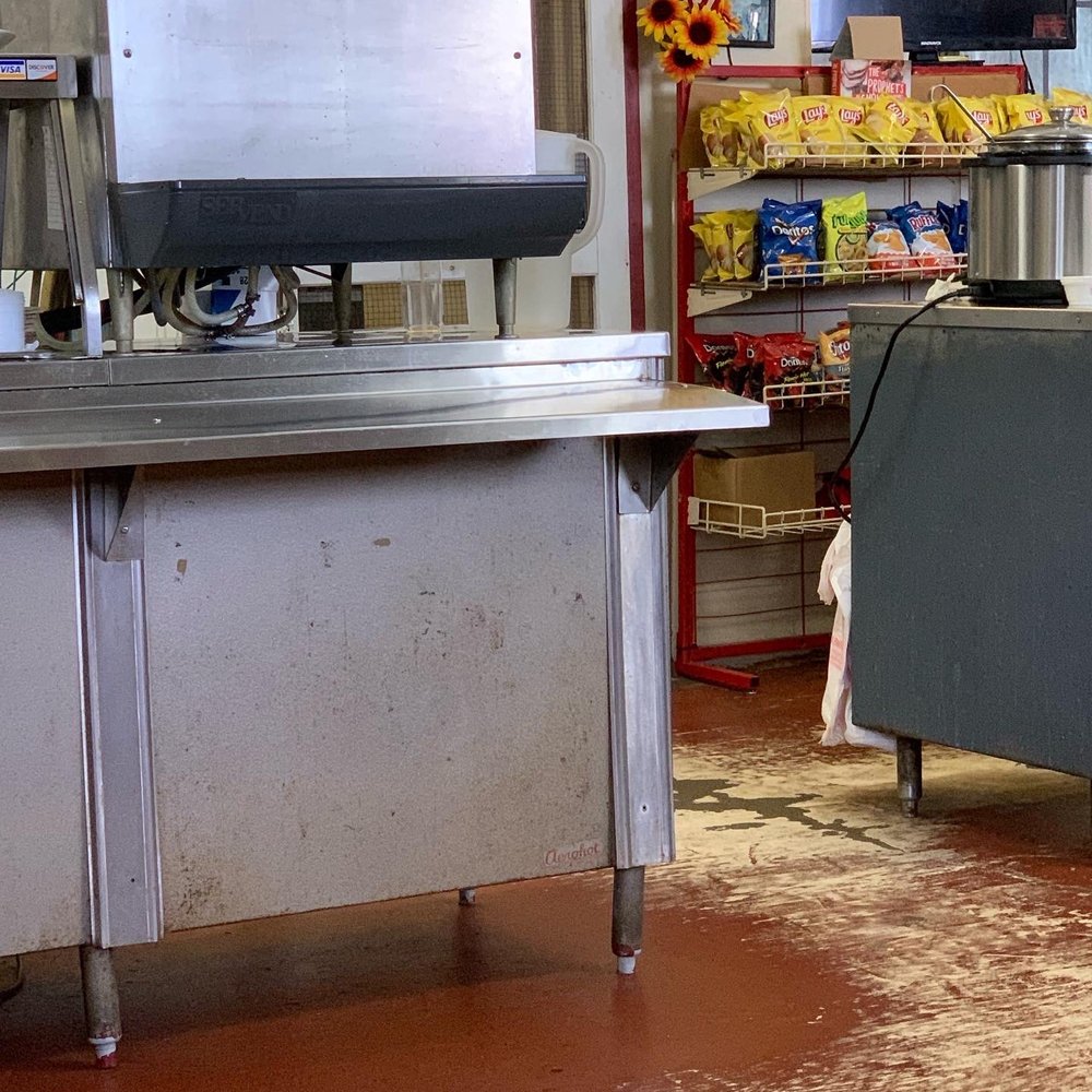 Longorias BBQ - a commercial kitchen with a counter and chairs - Barbeque Near Me - Fort Worth, Texas Longorias BBQ - a commercial kitchen with a counter and chairs - Barbeque Near Me - Fort Worth, Texas