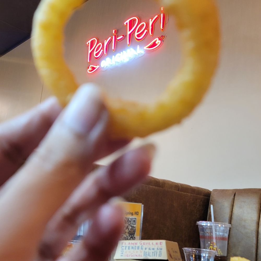Nash & Smashed - a hand holding a piece of food - Sandwiches Near Me - Silver Spring, Maryland Nash & Smashed - a hand holding a piece of food - Sandwiches Near Me - Silver Spring, Maryland