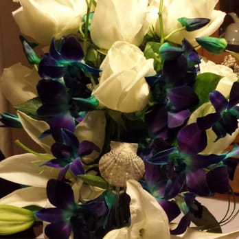 Seaside Flowers - Got a custom arrangement for my mom's birthday...love the orchids with white flowers. - Florists Near Me - Oceanside, California