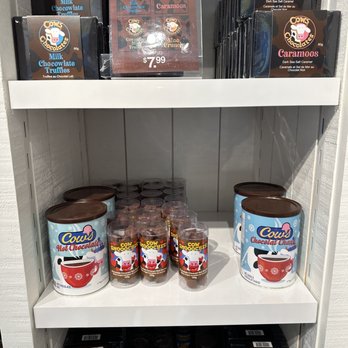 Cows - a shelf full of chocolates and cookies - Ice Cream & Frozen Yogurt Near Me - Halifax, Nova Scotia
