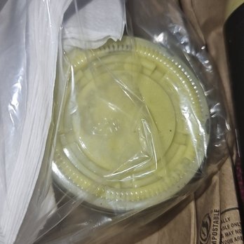 El Gordo- UNION TOWNSHIP - Green sauce, napkins, & plasticware for to-go order - Peruvian Near Me - Union, New Jersey