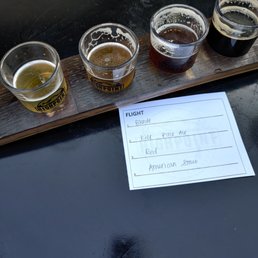 Flight with blonde, pale ale, red ale, and stout