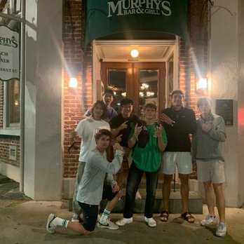 Murphy's Bar & Grill - a group of people taking a picture - Irish Pub Near Me - Honolulu, Hawaii Murphy's Bar & Grill - a group of people taking a picture - Irish Pub Near Me - Honolulu, Hawaii