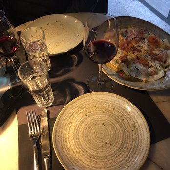 Juana la Loca - Huevos rotos with fries and truffled bacon - Tapas/Small Plates Near Me - Madrid, M Juana la Loca - Huevos rotos with fries and truffled bacon - Tapas/Small Plates Near Me - Madrid, M