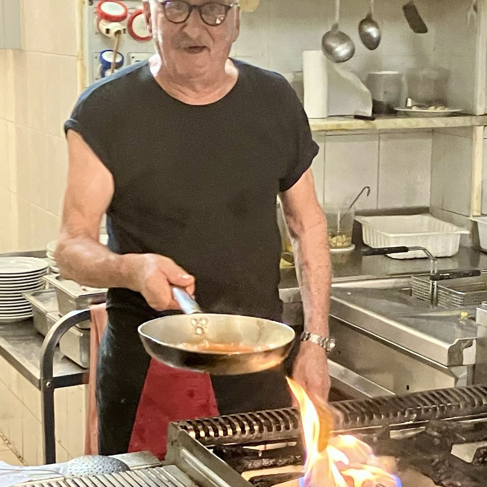 Da Mario - In the kitchen. The cook. - Italian Near Me - Genoa, GE Da Mario - In the kitchen. The cook. - Italian Near Me - Genoa, GE