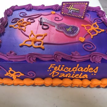 Olivari Bakery - a purple and orange cake with a guitar on it - Bakeries Near Me - Rosenberg, Texas