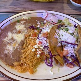 Two tacos, rice and beans