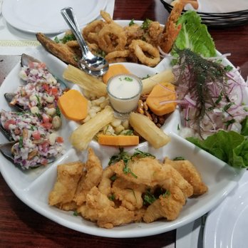 Chios Peruvian Grill - Piqueo Marino choros a la chalaca, ceviche, chicharron de pescado, jalea de mariscos, leche de tigre, camote, choclo, yuca y cancha. - Peruvian Near Me - Van Nuys, California