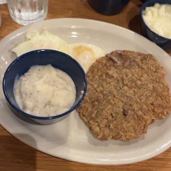 Cracker Barrel Old Country Store - Grandpa's Fried Country Breakfast with chicken fried steak and grits on the side - Southern Near Me - Little Rock, Arkansas Cracker Barrel Old Country Store - Grandpa's Fried Country Breakfast with chicken fried steak and grits on the side - Southern Near Me - Little Rock, Arkansas