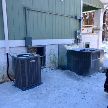 Tennessee Home Solutions - two air conditioners in the snow - Electricians Near Me - Martin, Tennessee Tennessee Home Solutions - two air conditioners in the snow - Electricians Near Me - Martin, Tennessee