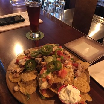 Caston & Main Brew Yard - The nachos were killer! Loaded with layers of beer cheese, so no chip gets left behind! - New American Near Me - Akron, Ohio