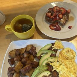 Kitchen sink breakfast, mint tea, churro French toast with strawberries Kitchen sink breakfast, mint tea, churro French toast with strawberries