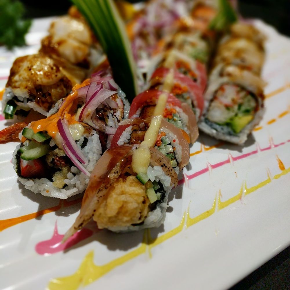 a variety of sushi rolls a variety of sushi rolls