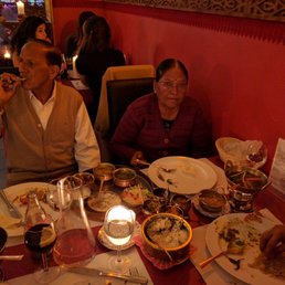 In-laws enjoying food here. Amritsar Curry kofta, laacha paratha, butter chicken.