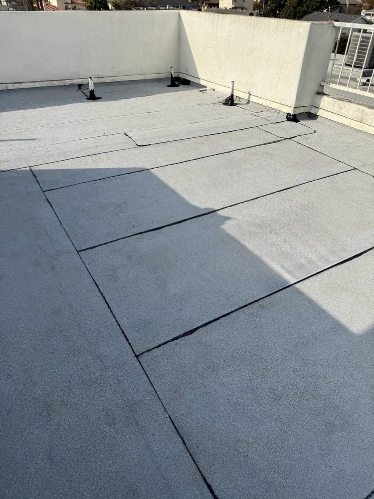 Slide of Economy Roofing