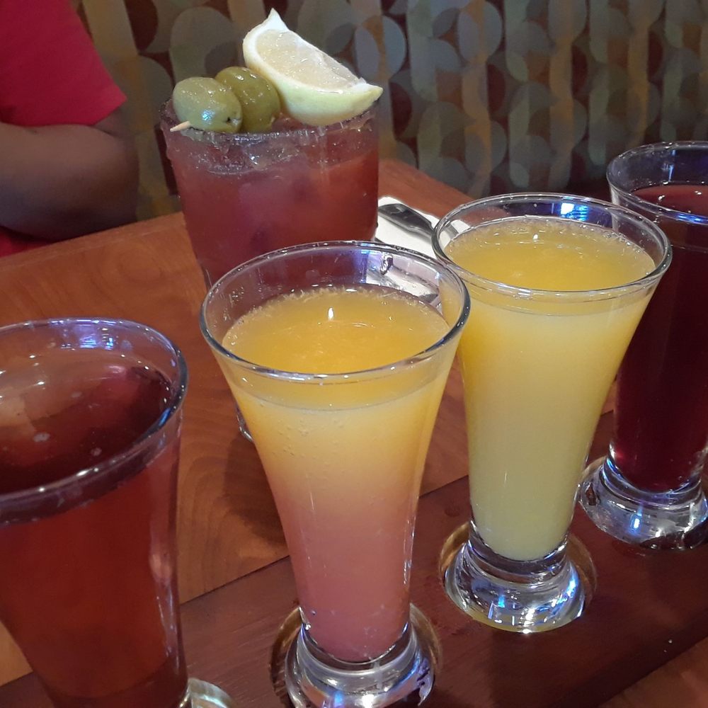 Broken Yolk Cafe - Flight of Mimosas and Bloody Mary in the background! Yum! - Breakfast & Brunch Near Me - Mesa, Arizona Broken Yolk Cafe - Flight of Mimosas and Bloody Mary in the background! Yum! - Breakfast & Brunch Near Me - Mesa, Arizona