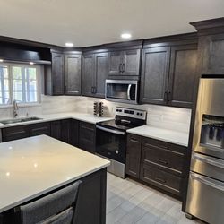 Notice the bridge nook above the window and the bumped out cabinet above the microwave.